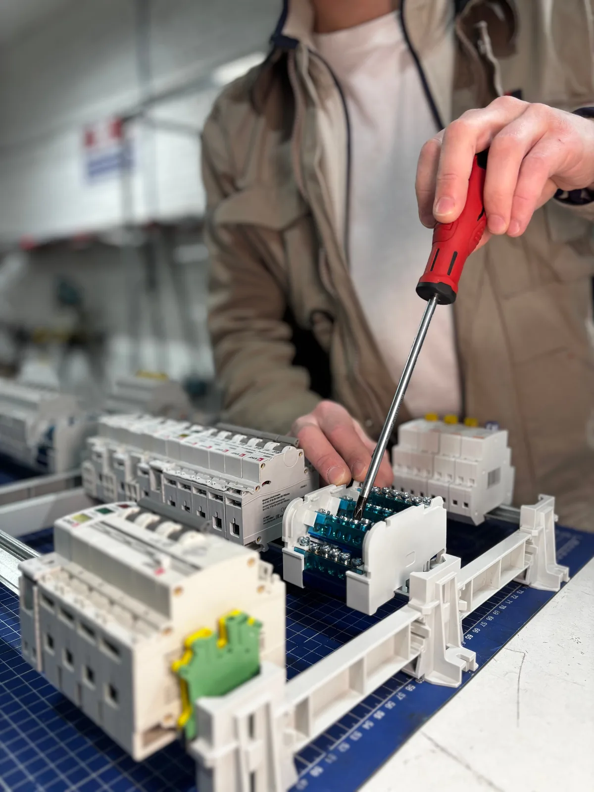 Breakers assembled on a DIN rail before installation, for licensed electrician in Barrie