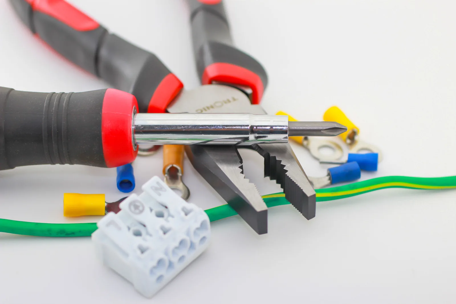 Pliers, a screwdriver, ferrules and a connector block, for electrician in Barrie