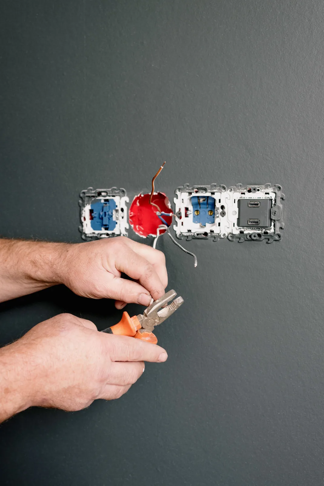 Wiring an outlet box into a finished wall, for code violation in Barrie