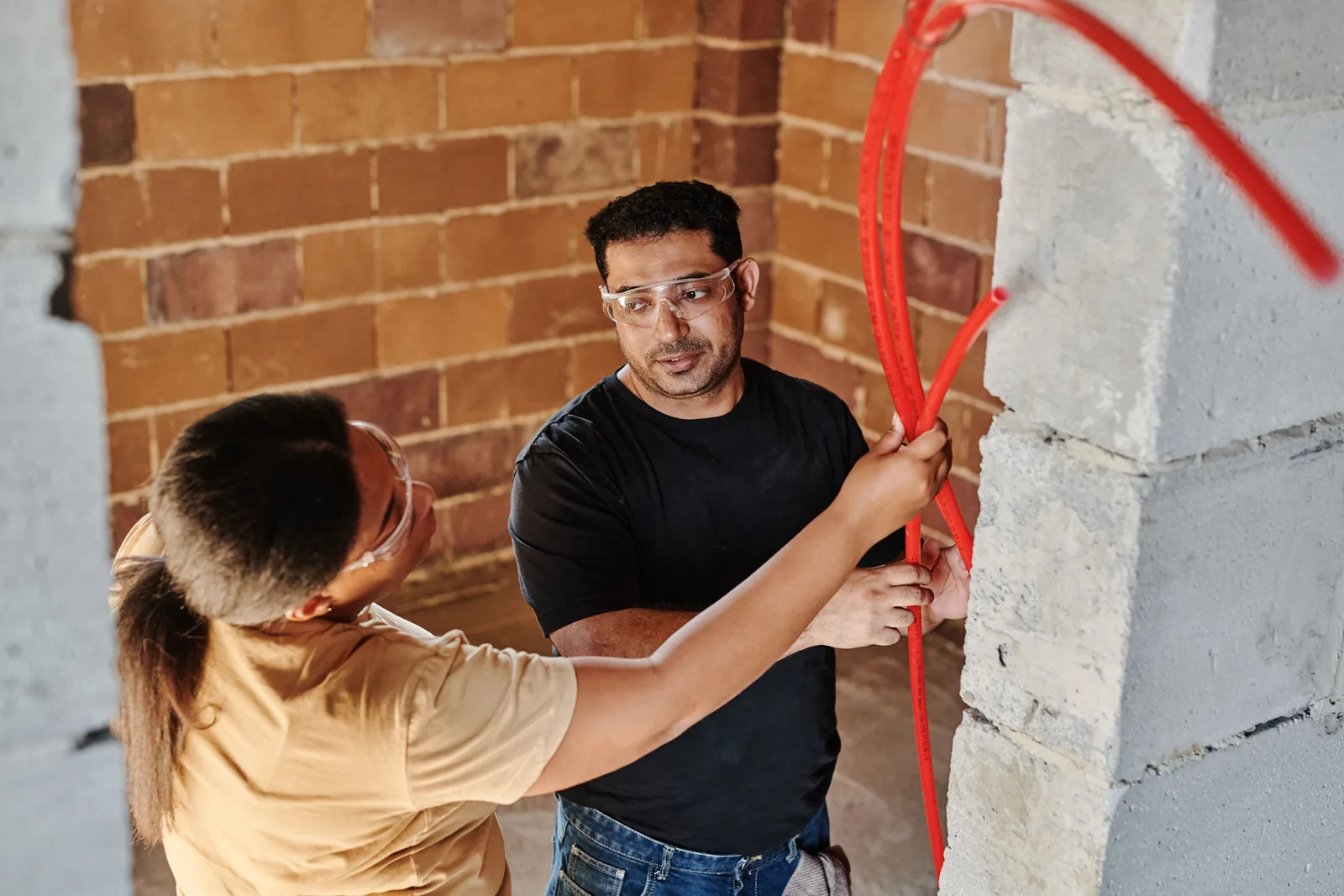 Running conduit across a block wall, for ev rebate in Barrie