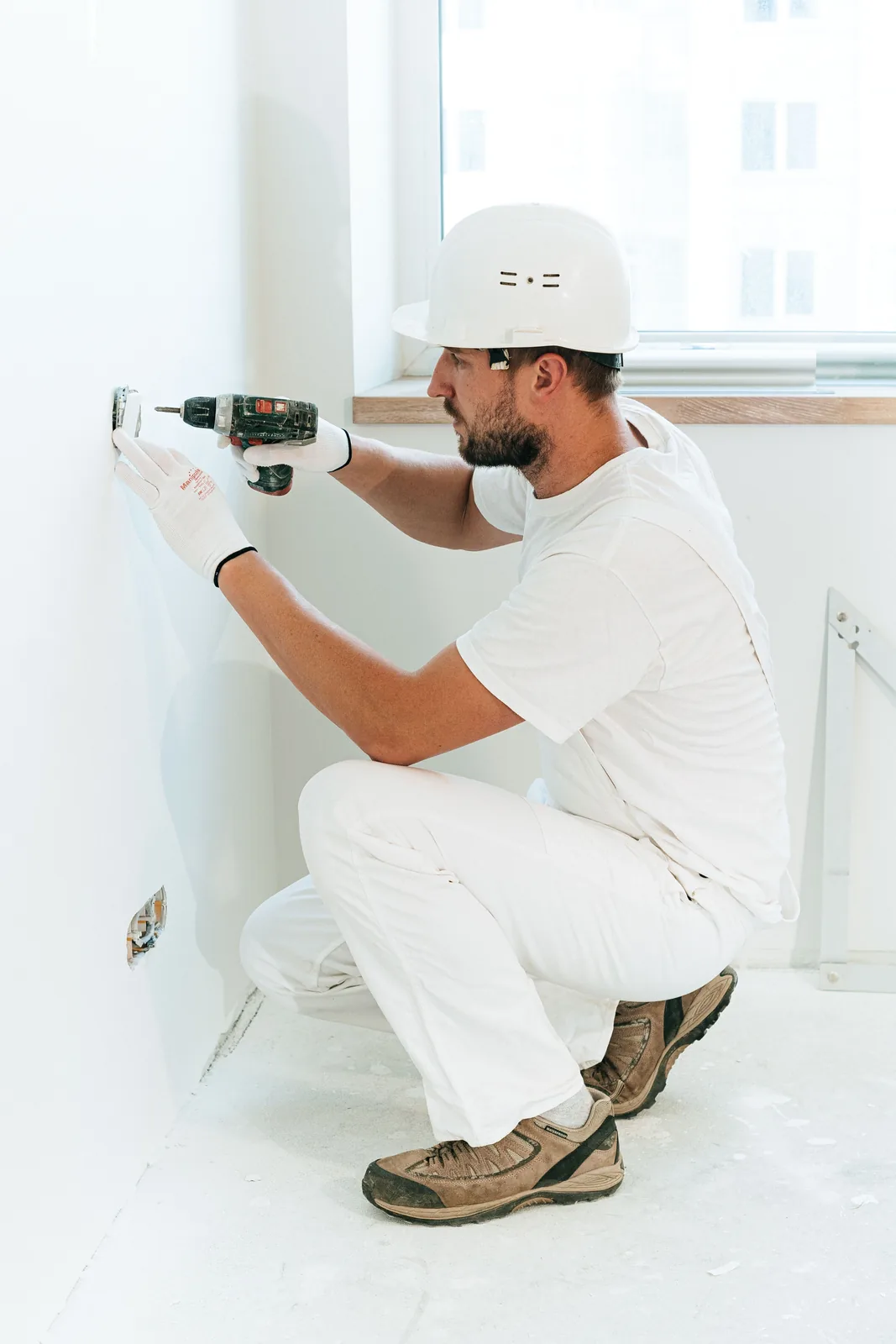 Fixing a socket into a finished wall, for electrician in Barrie